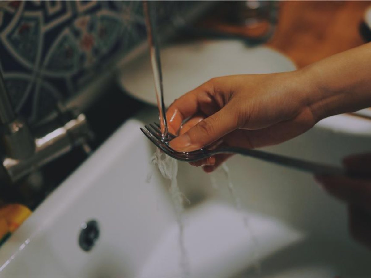 A clean sink and tap fixture in a bright bathroom — representative imagery, not a specific Godvision Cleaning job